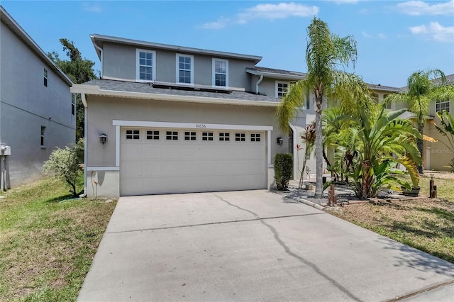 10636 Dawns Light Dr, Riverview, FL 33578 - view of front of property featuring stucco siding, an attached garage, and concrete driveway