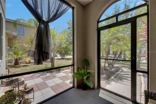 10636 Dawns Light Dr, Riverview, FL 33578 - unfurnished sunroom featuring carpet floors
