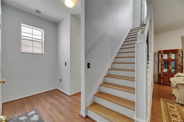 10636 Dawns Light Dr, Riverview, FL 33578 - staircase with wood finished floors and baseboards