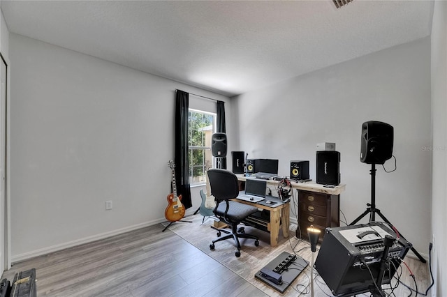 10636 Dawns Light Dr, Riverview, FL 33578 - office area featuring light wood finished floors and baseboards