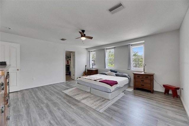 10636 Dawns Light Dr, Riverview, FL 33578 - bedroom featuring wood finished floors, baseboards, and ceiling fan
