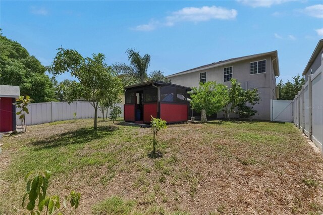 10636 Dawns Light Dr, Riverview, FL 33578 - view of yard featuring a gate and an outbuilding