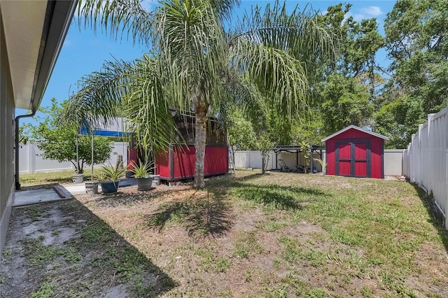10636 Dawns Light Dr, Riverview, FL 33578 - view of yard featuring a storage unit and an outdoor structure