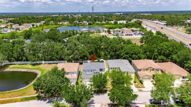 10636 Dawns Light Dr, Riverview, FL 33578 - aerial view of residential area with a nearby body of water and a tree filled landscape