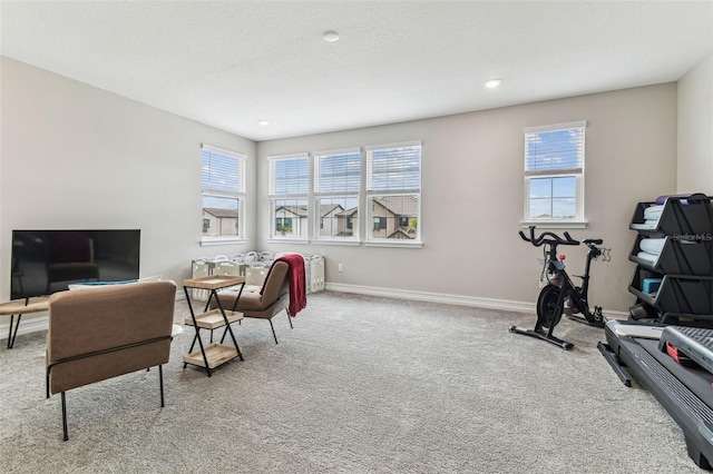 office featuring carpet floors, baseboards, and recessed lighting