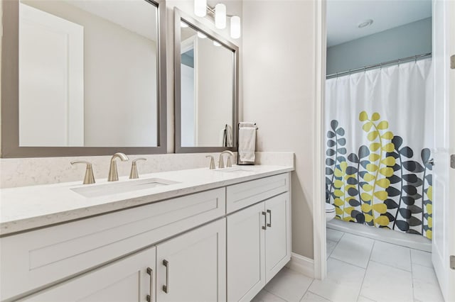 bathroom with toilet, double vanity, curtained shower, and tile patterned flooring