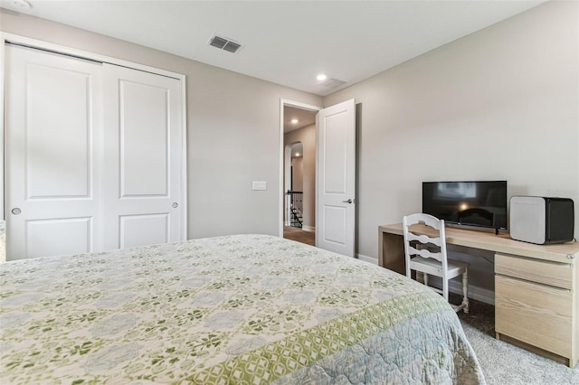 bedroom featuring recessed lighting, carpet flooring, a closet, and baseboards