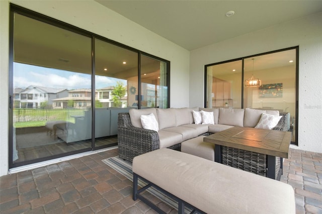 sunroom / solarium featuring an outdoor living space