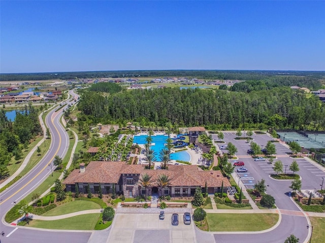 aerial overview of property's location with a pool area