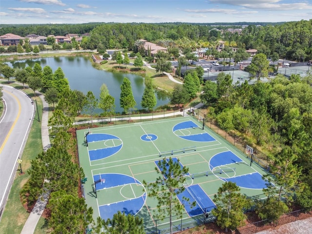 view of sport court with community basketball court and a water view