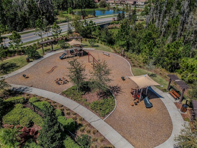 drone / aerial view of a community park and a large body of water