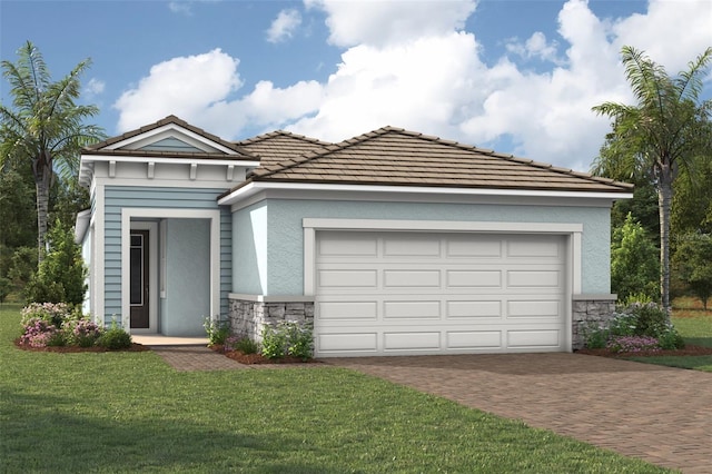 11375 Boundless Ter, Venice, FL 34293 - view of front of property with decorative driveway, an attached garage, stone siding, and stucco siding