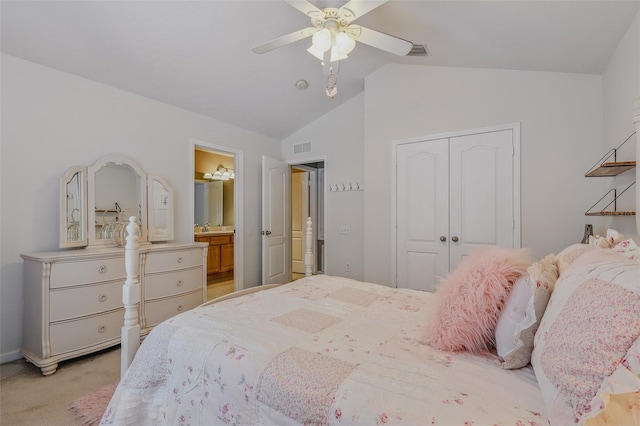 bedroom featuring a ceiling fan, visible vents, a closet, lofted ceiling, and light carpet