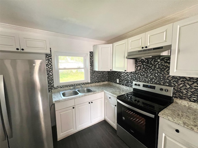 kitchen featuring backsplash, appliances with stainless steel finishes, a sink, white cabinets, and under cabinet range hood