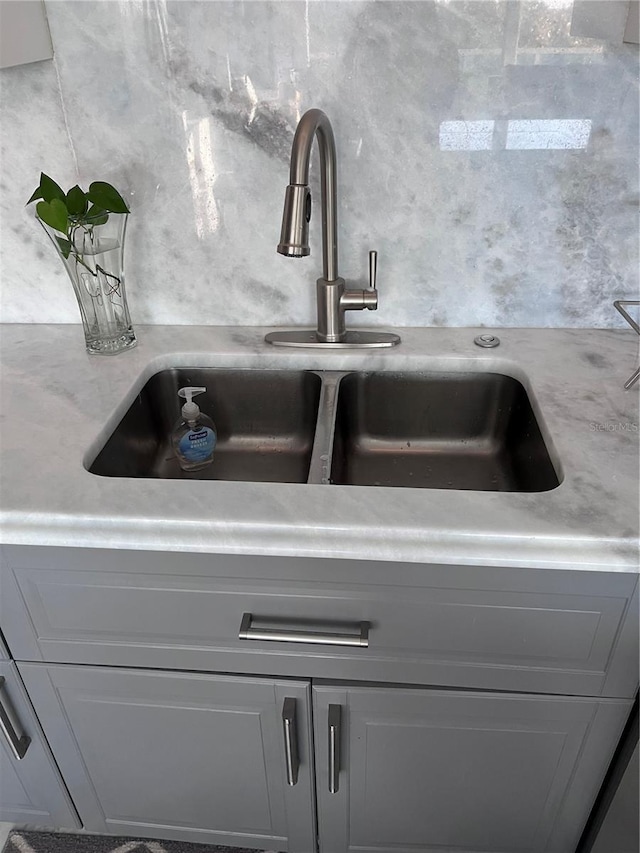 details with light countertops and a sink