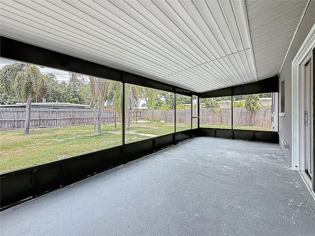 unfurnished sunroom with plenty of natural light