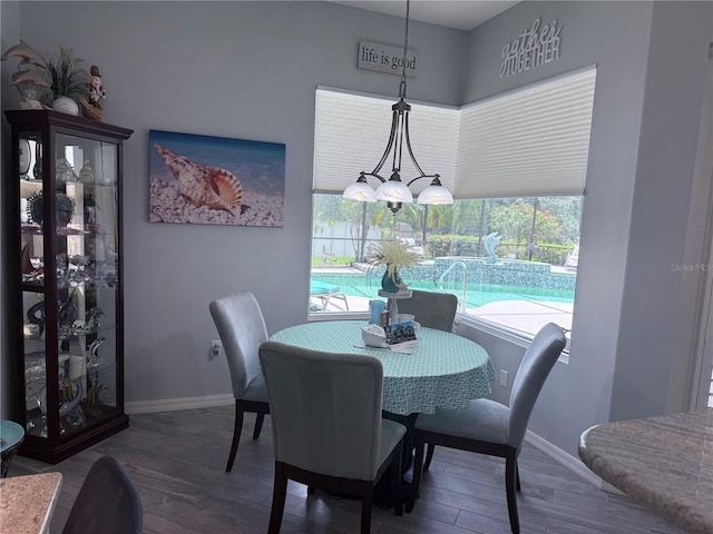 2908 89th Ave E, Parrish, FL 34219 - dining room featuring healthy amount of natural light, wood finished floors, and baseboards