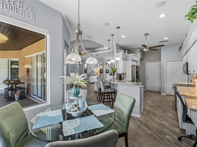 2908 89th Ave E, Parrish, FL 34219 - dining room featuring recessed lighting, dark wood-style floors, a ceiling fan, and baseboards