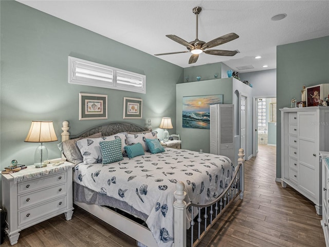 2908 89th Ave E, Parrish, FL 34219 - bedroom featuring dark wood finished floors, a ceiling fan, recessed lighting, and a textured ceiling