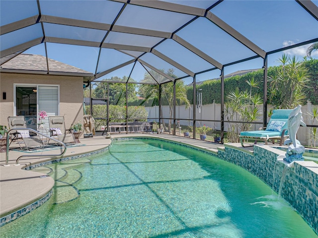 2908 89th Ave E, Parrish, FL 34219 - view of swimming pool featuring a patio area, a pool with connected hot tub, and glass enclosure