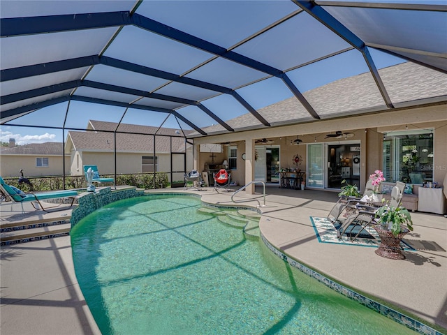 2908 89th Ave E, Parrish, FL 34219 - outdoor pool with a ceiling fan, a patio area, and glass enclosure