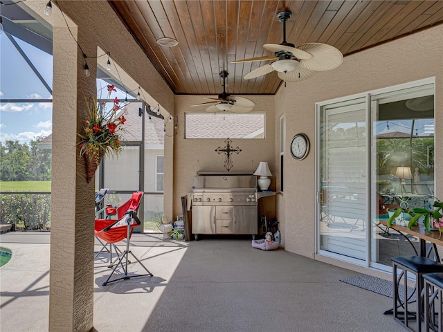 2908 89th Ave E, Parrish, FL 34219 - view of patio / terrace featuring a lanai, ceiling fan, and a grill