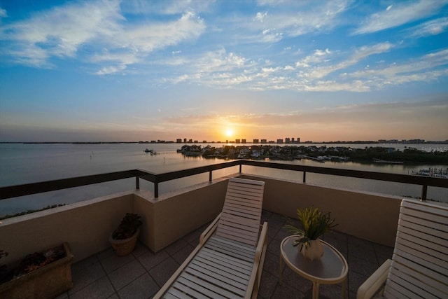 4 Belleview Blvd Unit 802, Belleair, FL 33756 - balcony at dusk featuring a water view