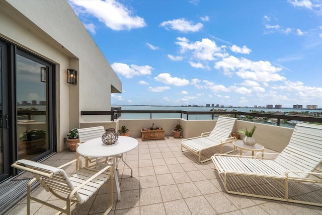 4 Belleview Blvd Unit 802, Belleair, FL 33756 - view of patio featuring a view of city, a water view, and a balcony