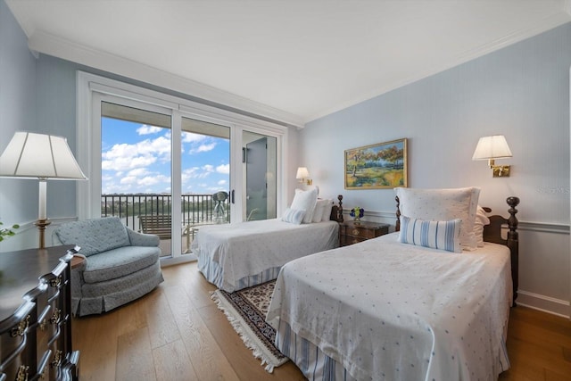 4 Belleview Blvd Unit 802, Belleair, FL 33756 - bedroom featuring baseboards, access to outside, ornamental molding, and hardwood / wood-style floors