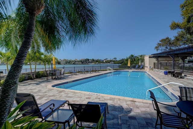 4 Belleview Blvd Unit 802, Belleair, FL 33756 - community pool featuring a patio, fence, and a water view