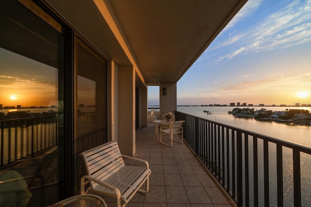 4 Belleview Blvd Unit 802, Belleair, FL 33756 - balcony at dusk with a water view