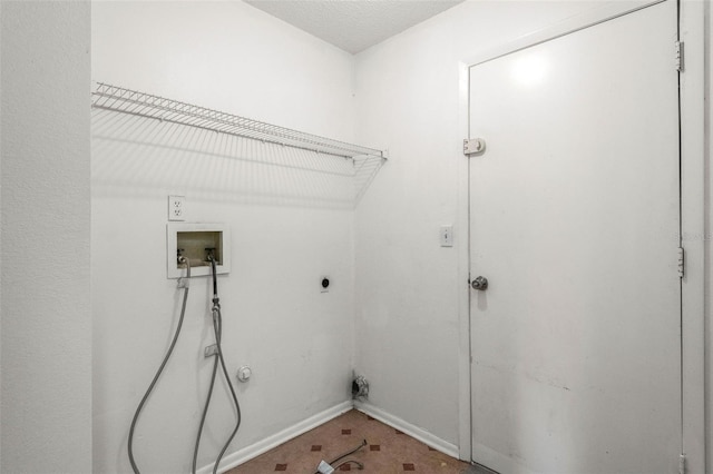 laundry area with washer hookup, baseboards, laundry area, and electric dryer hookup