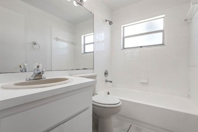 bathroom with vanity, tile patterned floors, shower / bathtub combination, and toilet