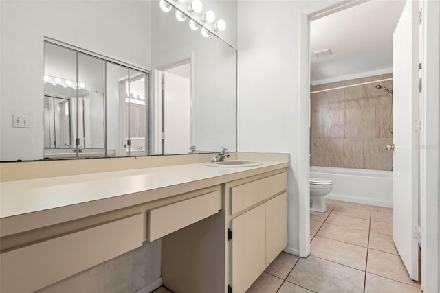 full bathroom with shower / bathtub combination, toilet, tile patterned floors, and vanity