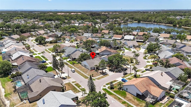 aerial view featuring a water view and a residential view