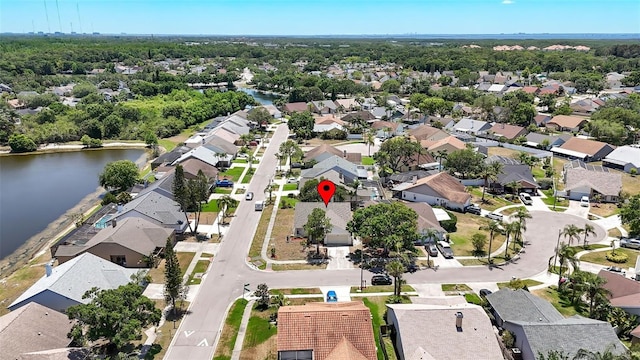 aerial view featuring a water view and a residential view