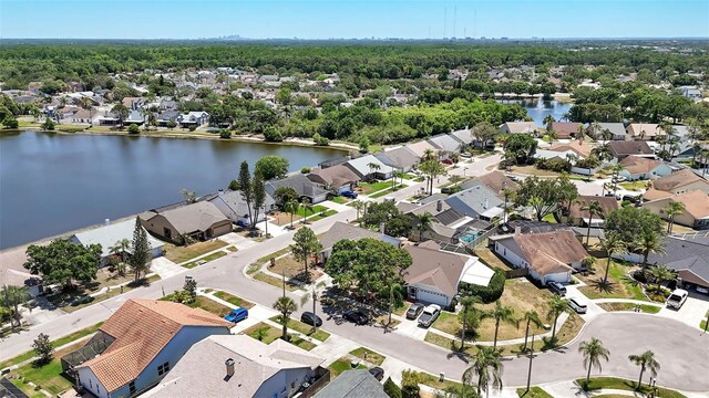 aerial view with a water view and a residential view