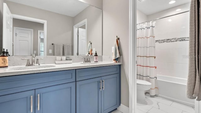 full bathroom with toilet, shower / bath combo, a sink, and marble finish floor