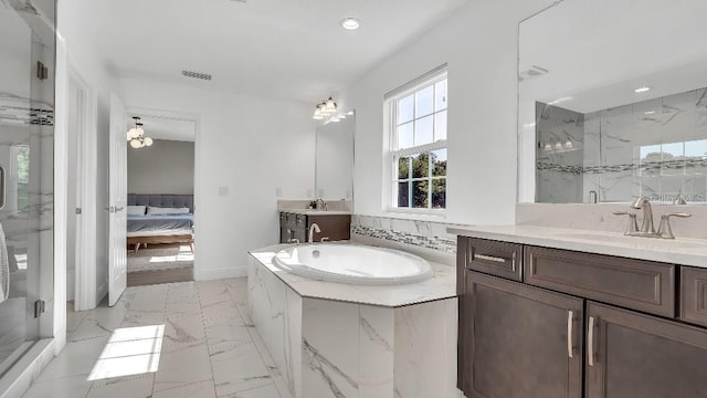 ensuite bathroom featuring a sink, a marble finish shower, recessed lighting, visible vents, and a bath