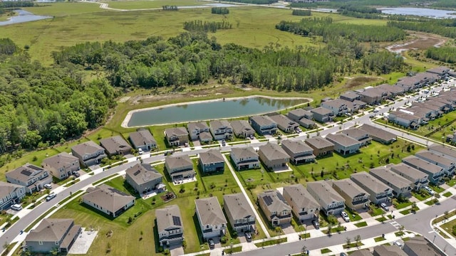 aerial view with a water view and a residential view