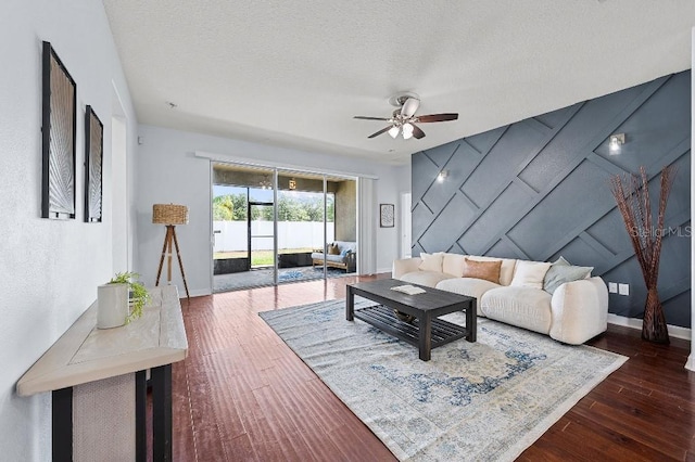 18677 Milton Keynes Ct, Land O Lakes, FL 34638 - living area with baseboards, a ceiling fan, and wood finished floors