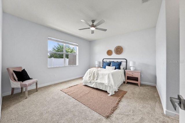 18677 Milton Keynes Ct, Land O Lakes, FL 34638 - carpeted bedroom featuring baseboards and a ceiling fan