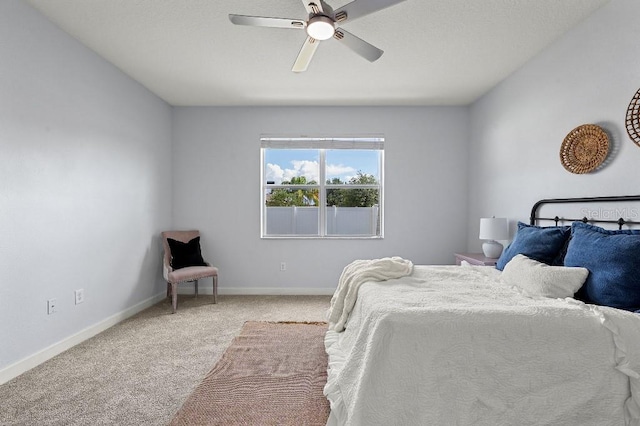 18677 Milton Keynes Ct, Land O Lakes, FL 34638 - bedroom with carpet floors, baseboards, and a ceiling fan