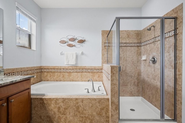 18677 Milton Keynes Ct, Land O Lakes, FL 34638 - full bath with a stall shower, a bath, and vanity