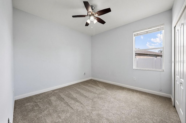 18677 Milton Keynes Ct, Land O Lakes, FL 34638 - carpeted spare room featuring baseboards and ceiling fan