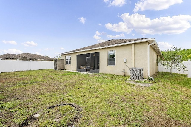 18677 Milton Keynes Ct, Land O Lakes, FL 34638 - rear view of property with stucco siding and cooling unit
