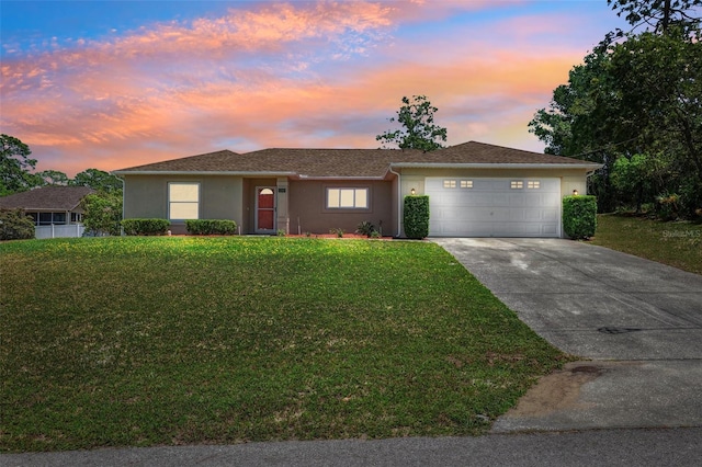 13040 Hanley Dr, Spring Hill, FL 34609 - ranch-style house with driveway, stucco siding, and a front lawn