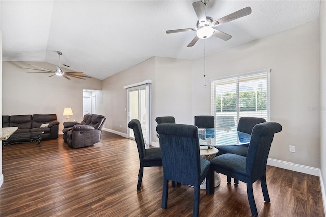 13040 Hanley Dr, Spring Hill, FL 34609 - dining room featuring lofted ceiling, baseboards, dark wood finished floors, and ceiling fan