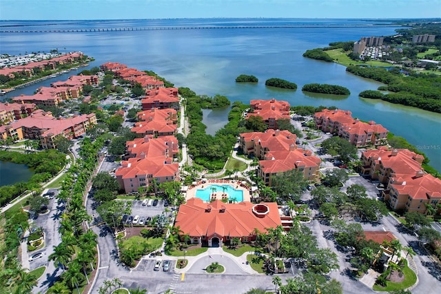 bird's eye view featuring a water view and a residential view
