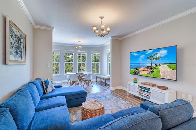 living area with crown molding, baseboards, wood finished floors, and a chandelier